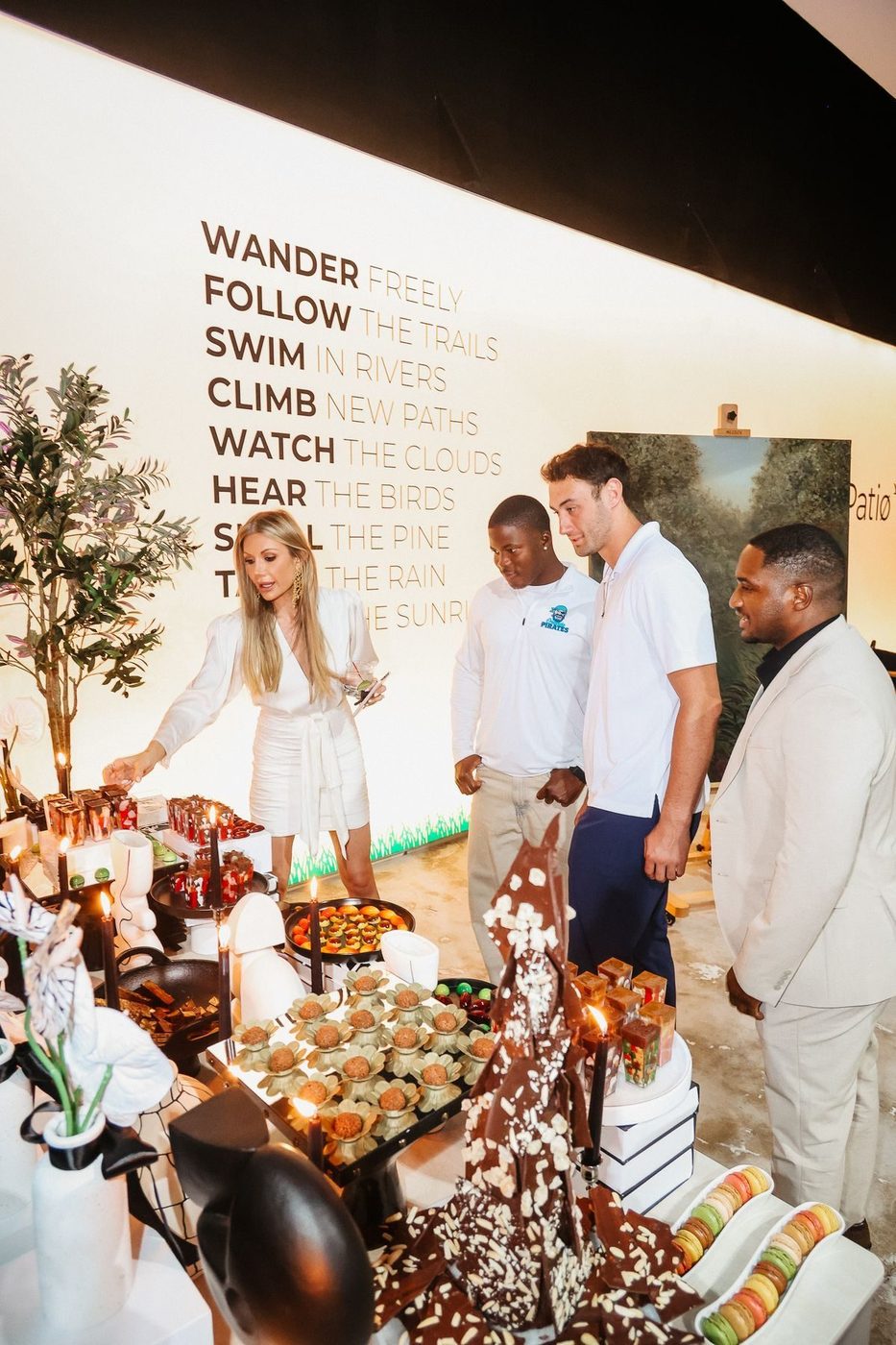 Guests at a dessert display