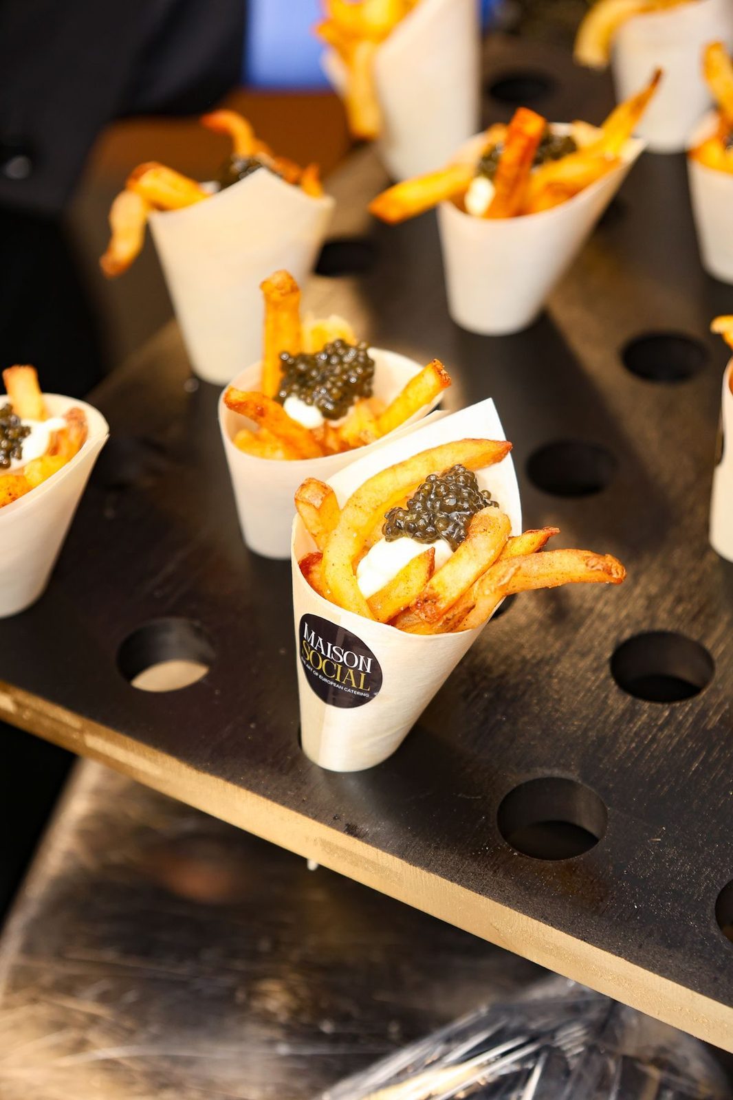 Fries with caviar in Maison Social paper cones